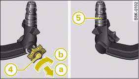 Removable towing bracket: Setting the spring mechanism to the "ready" position